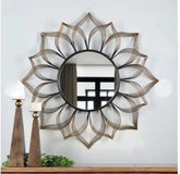 Modern circular mirror reflecting natural light in living room setting